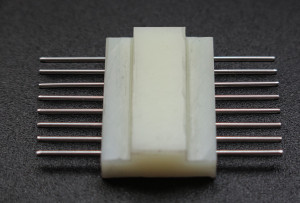Polyamide (Caprolon) eight channel flow cell for experiments with organic solvents